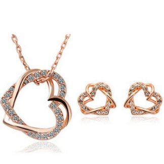 Conjunto de collar y pendientes con corazón de diamantes dobles