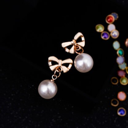 Pendientes de perla con lazo - Image 5